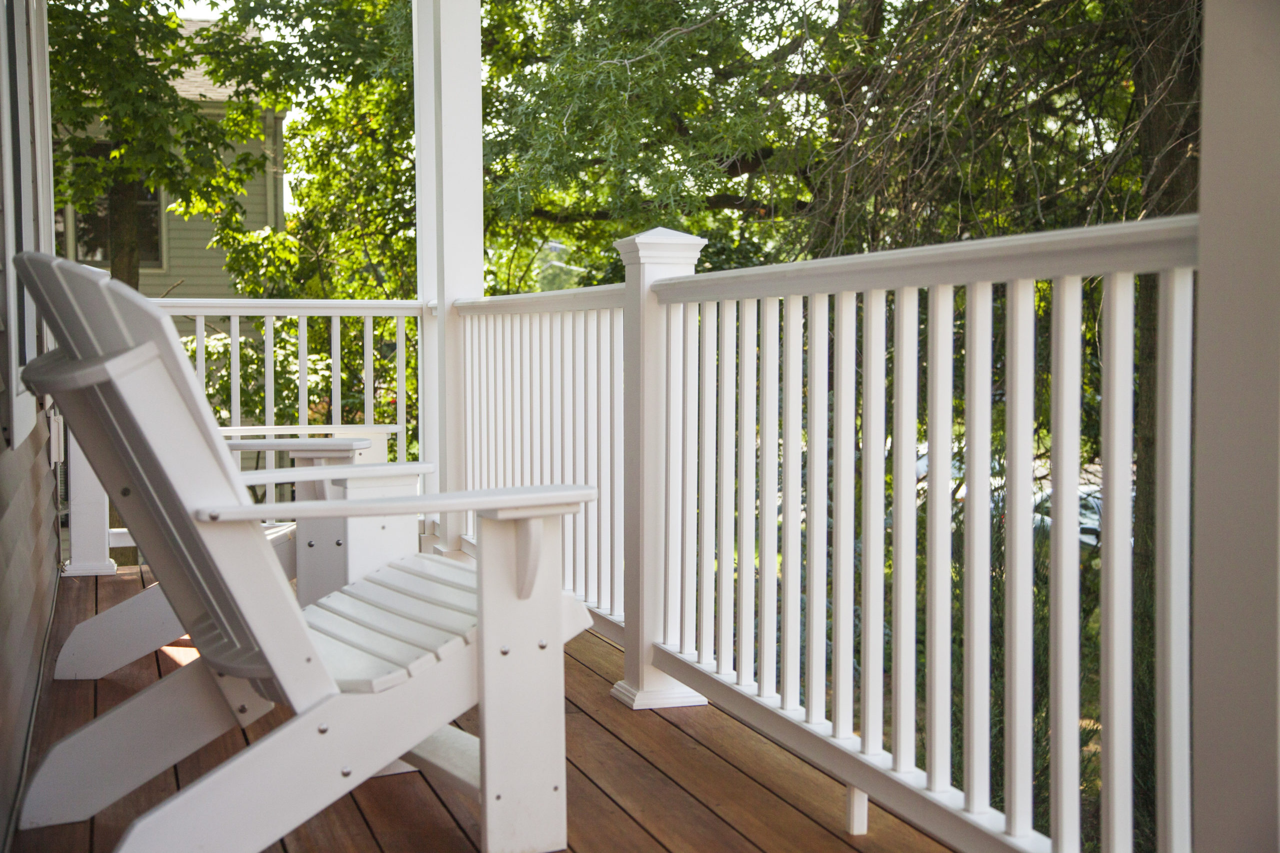 What are the differences between low maintenance and wood railings?